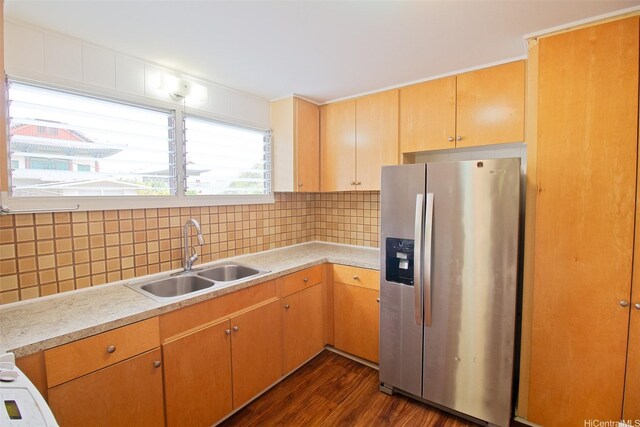 2410 Halenoho Pl, Honolulu, HI 96816 - kitchen with stainless steel fridge with ice dispenser, light countertops, dark wood-style floors, and decorative backsplash