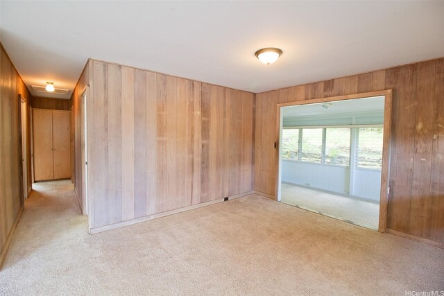 2410 Halenoho Pl, Honolulu, HI 96816 - empty room with carpet flooring and wood walls