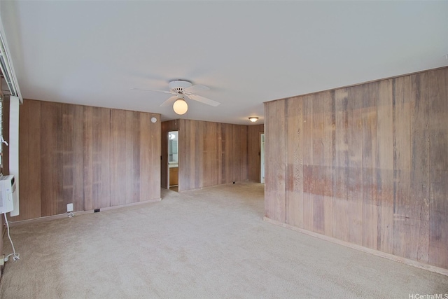 2410 Halenoho Pl, Honolulu, HI 96816 - unfurnished room featuring wooden walls, ceiling fan, and carpet floors