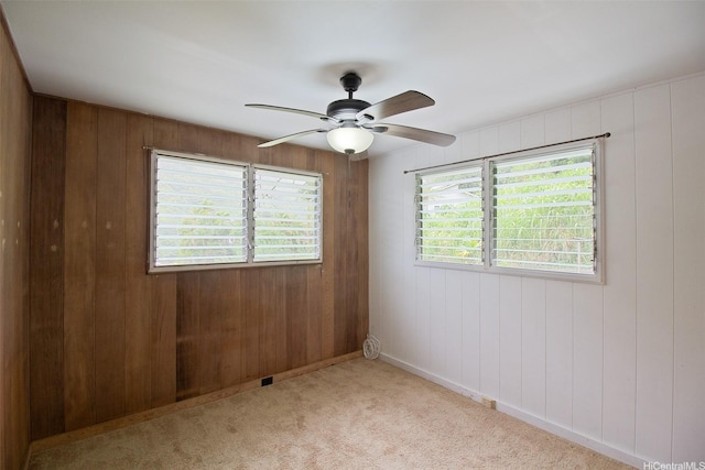 2410 Halenoho Pl, Honolulu, HI 96816 - carpeted spare room featuring a ceiling fan and wooden walls