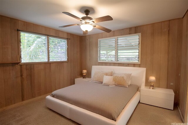 2410 Halenoho Pl, Honolulu, HI 96816 - bedroom featuring wooden walls, carpet flooring, and ceiling fan