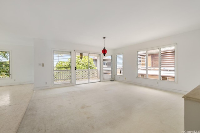 3153 Diamond Head Rd, Honolulu, HI 96815 - empty room with healthy amount of natural light and carpet flooring
