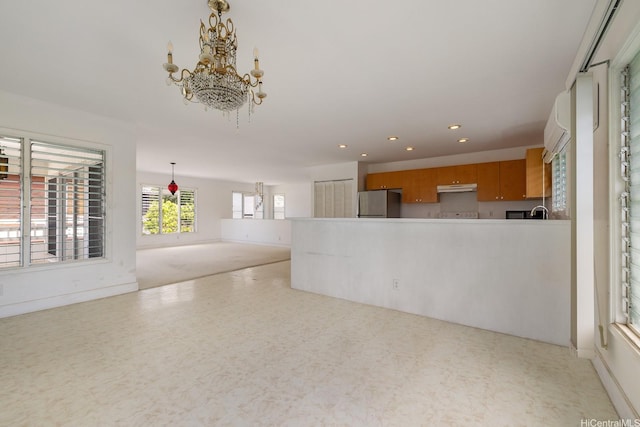 3153 Diamond Head Rd, Honolulu, HI 96815 - unfurnished living room featuring a chandelier, recessed lighting, and light flooring