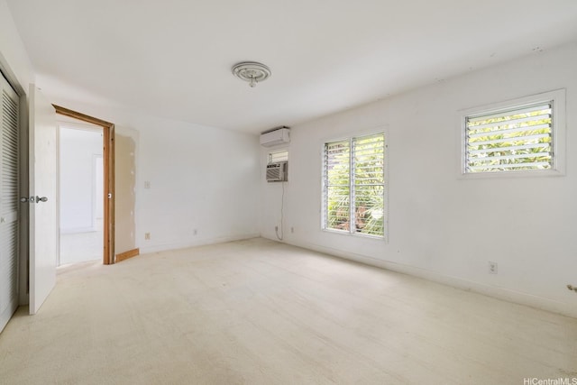 3153 Diamond Head Rd, Honolulu, HI 96815 - unfurnished room with light colored carpet and a wall mounted AC