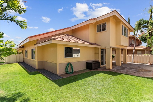 91-1186 Namahoe St, Kapolei, HI 96707 - back of property with a patio, stucco siding, and a tiled roof