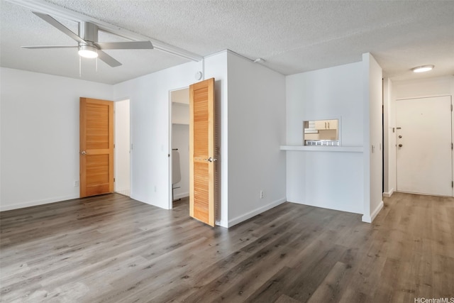 1215 Alexander St Unit 204, Honolulu, HI 96826 - unfurnished living room with wood finished floors, a ceiling fan, and a textured ceiling