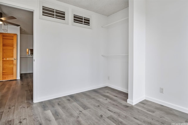 1215 Alexander St Unit 204, Honolulu, HI 96826 - spare room with wood finished floors and ceiling fan