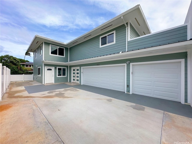 813 20th Ave, Honolulu, HI 96816 - view of side of home featuring driveway and a garage
