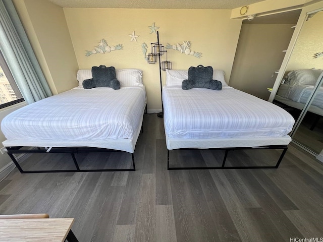 444 Niu St Unit 2906, Honolulu, HI 96815 - bedroom with wood finished floors and baseboards