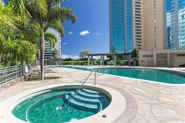 1177 Queen St Unit 2906, Honolulu, HI 96814 - community pool featuring a hot tub and a patio