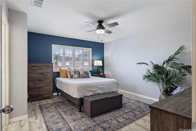 91-1031 Kaimalie St Unit 4M4, Ewa Beach, HI 96706 - bedroom with wood finished floors and a ceiling fan