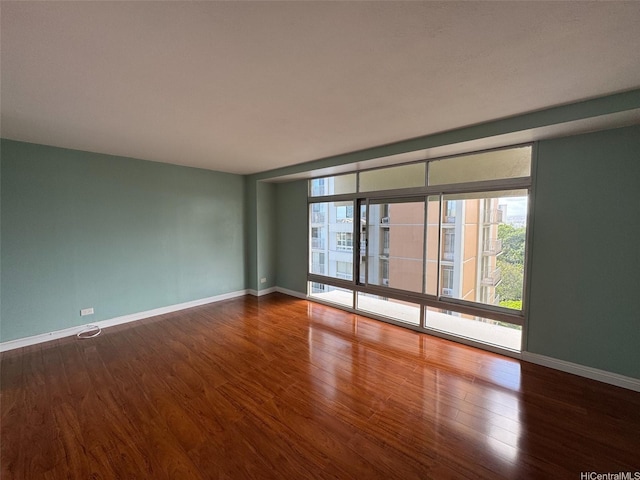 1519 Nuuanu Ave Unit 1146, Honolulu, HI 96817 - unfurnished room featuring wood finished floors and baseboards