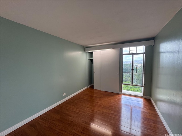 1519 Nuuanu Ave Unit 1146, Honolulu, HI 96817 - empty room featuring wood finished floors and baseboards