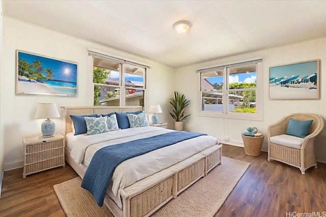 101 Kawananakoa Pl, Honolulu, HI 96817 - bedroom with multiple windows and wood finished floors