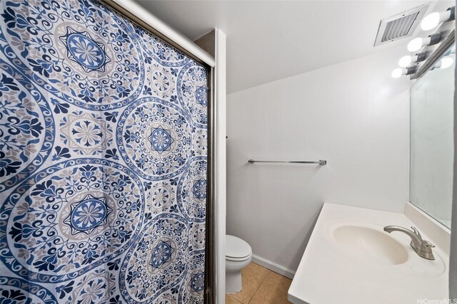 1535 Pensacola St Unit 208, Honolulu, HI 96822 - bathroom featuring tile patterned floors, vanity, and a shower