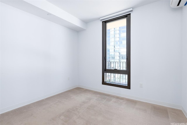 987 Queen St Unit 1512, Honolulu, HI 96814 - empty room with light carpet and a wall mounted AC