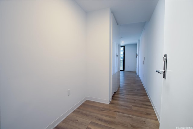 987 Queen St Unit 1512, Honolulu, HI 96814 - hall with wood finished floors and baseboards