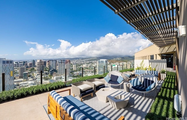 987 Queen St Unit 1512, Honolulu, HI 96814 - view of patio / terrace with an outdoor living space and a view of city