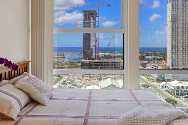909 Kapiolani Blvd Unit 2002, Honolulu, HI 96814 - bedroom featuring a view of city and a water view