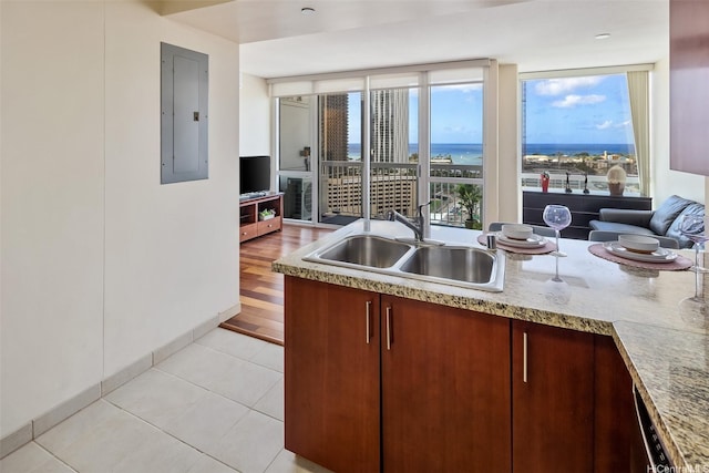 909 Kapiolani Blvd Unit 2002, Honolulu, HI 96814 - kitchen with electric panel and light tile patterned floors