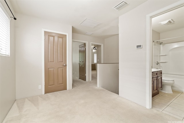 91-1200 Keaunui Dr Unit 208, Ewa Beach, HI 96706 - corridor with light colored carpet and light tile patterned floors