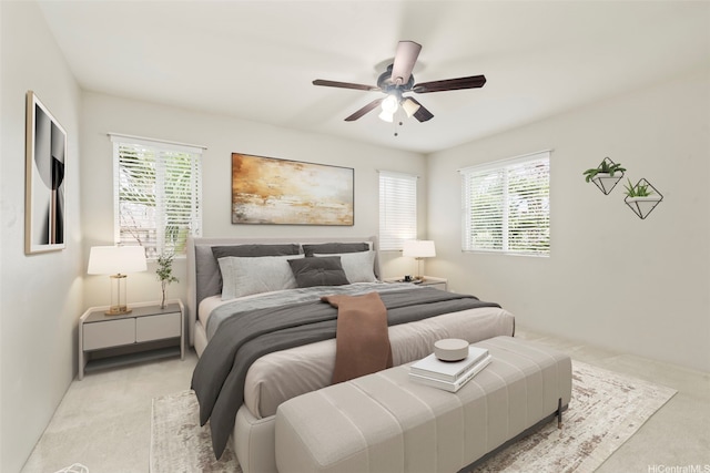 91-1200 Keaunui Dr Unit 208, Ewa Beach, HI 96706 - bedroom featuring light carpet, multiple windows, and a ceiling fan
