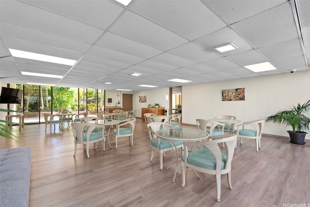 411 Hobron Ln Unit 3801, Honolulu, HI 96815 - dining room featuring a paneled ceiling and wood finished floors