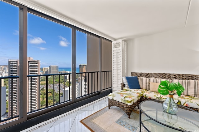 411 Hobron Ln Unit 3801, Honolulu, HI 96815 - sunroom / solarium featuring a city view, plenty of natural light, and a water view