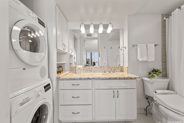 411 Hobron Ln Unit 3801, Honolulu, HI 96815 - bathroom with stacked washer / drying machine, vanity, a shower with curtain, and tile patterned floors