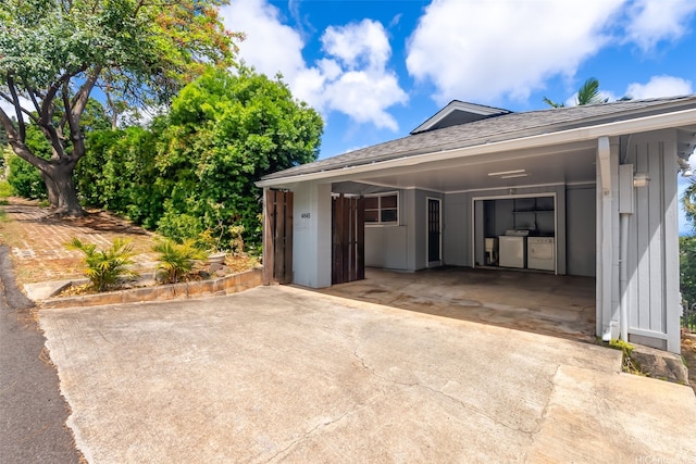 4845 Sierra Dr, Honolulu, HI 96816 - garage featuring a carport and concrete driveway