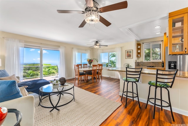4845 Sierra Dr, Honolulu, HI 96816 - living area with dark wood-style floors and ceiling fan