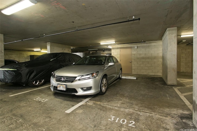 600 Ala Moana Blvd Unit 3401, Honolulu, HI 96813 - parking deck featuring concrete block wall