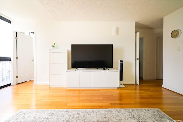 827 Kinau St Unit D703, Honolulu, HI 96813 - living area with light wood finished floors and a textured ceiling
