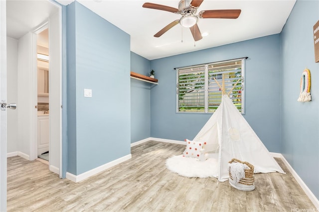 47-366 Hui Iwa St Unit 71, Kaneohe, HI 96744 - playroom featuring wood finished floors and a ceiling fan