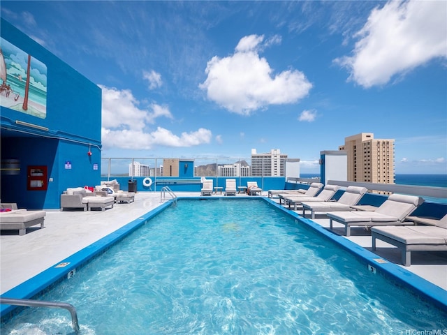2427 Kuhio Ave Unit 1501, Honolulu, HI 96815 - community pool with outdoor lounge area, a patio area, and a city view