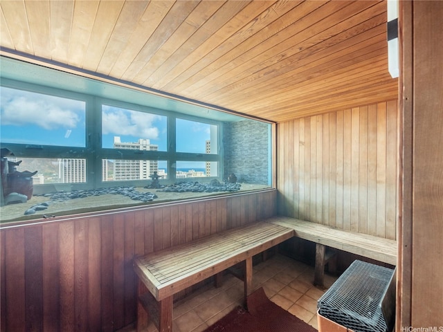 2427 Kuhio Ave Unit 1501, Honolulu, HI 96815 - sauna with wooden ceiling, wood walls, and tile patterned floors