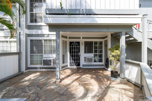 239 Mananai Pl Unit 54F, Honolulu, HI 96818 - view of exterior entry featuring a balcony