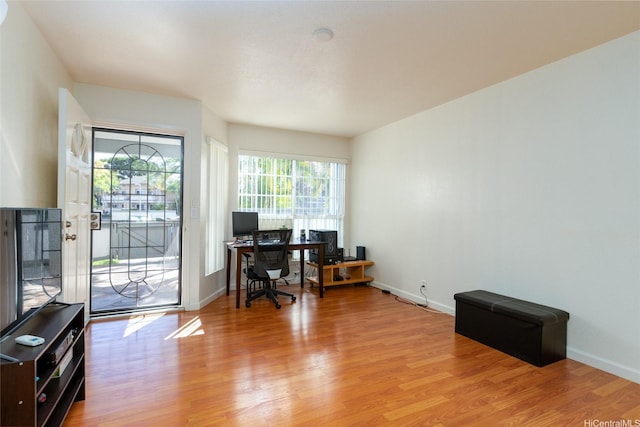 239 Mananai Pl Unit 54F, Honolulu, HI 96818 - office with light wood-style floors and baseboards