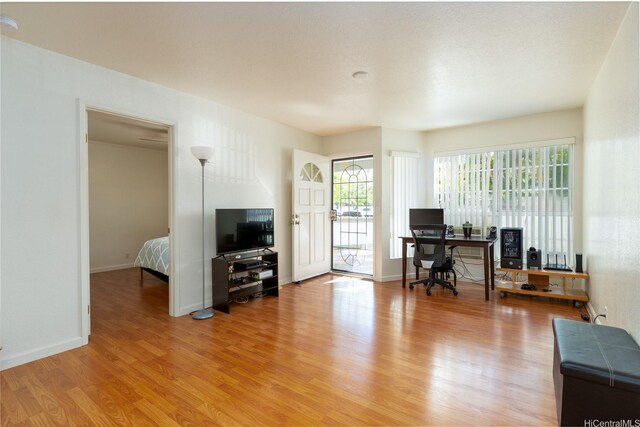 239 Mananai Pl Unit 54F, Honolulu, HI 96818 - home office featuring light wood finished floors and baseboards