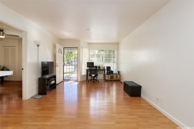 239 Mananai Pl Unit 54F, Honolulu, HI 96818 - home office featuring light wood finished floors and baseboards