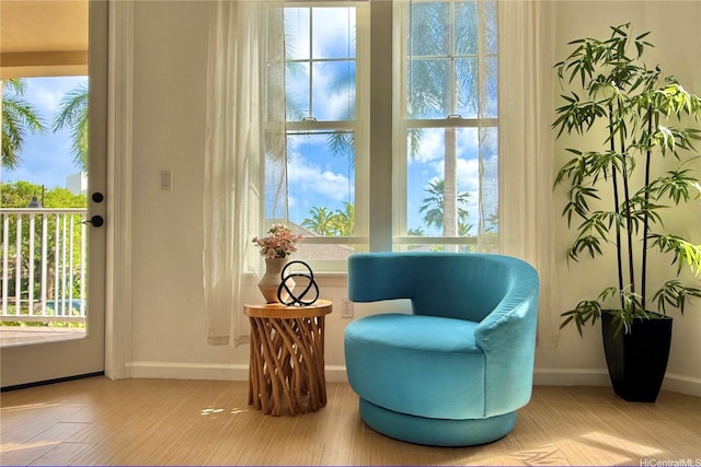 520 Lunalilo Home Rd Unit 6107, Honolulu, HI 96825 - sitting room with plenty of natural light and wood finished floors