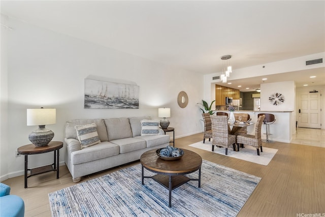 520 Lunalilo Home Rd Unit 6107, Honolulu, HI 96825 - living room featuring baseboards and recessed lighting