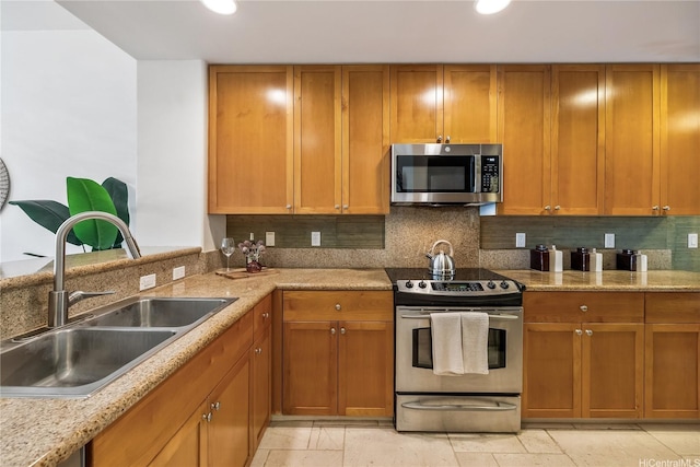520 Lunalilo Home Rd Unit 6107, Honolulu, HI 96825 - kitchen featuring appliances with stainless steel finishes, brown cabinets, backsplash, recessed lighting, and light stone counters