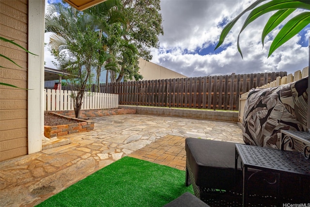 94-1465 Waipio Uka St Unit S103, Waipahu, HI 96797 - fenced backyard with a patio area