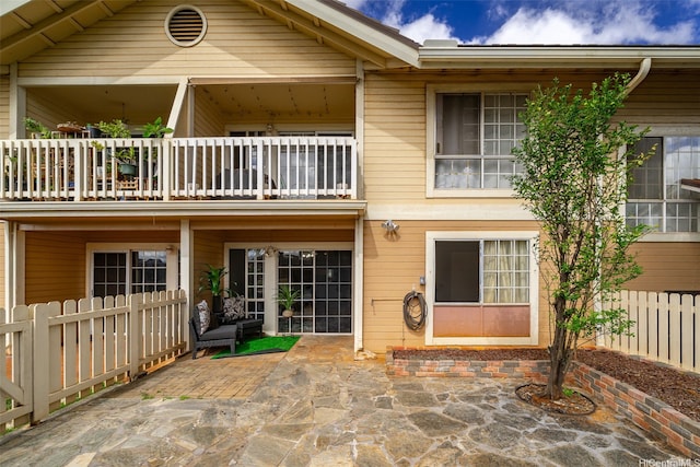 94-1465 Waipio Uka St Unit S103, Waipahu, HI 96797 - rear view of property with a balcony and a patio