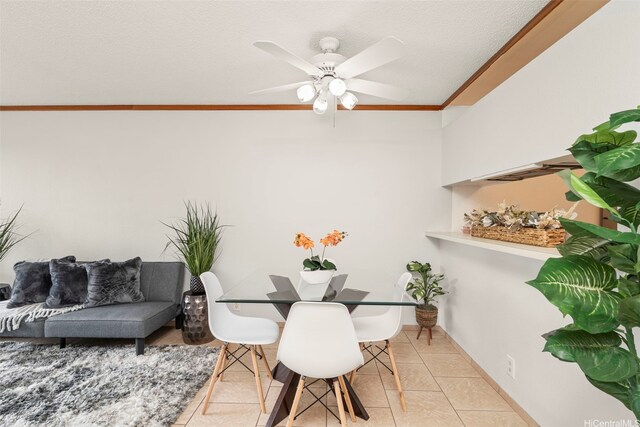 94-1465 Waipio Uka St Unit S103, Waipahu, HI 96797 - dining space featuring a ceiling fan, light tile patterned floors, a textured ceiling, and ornamental molding