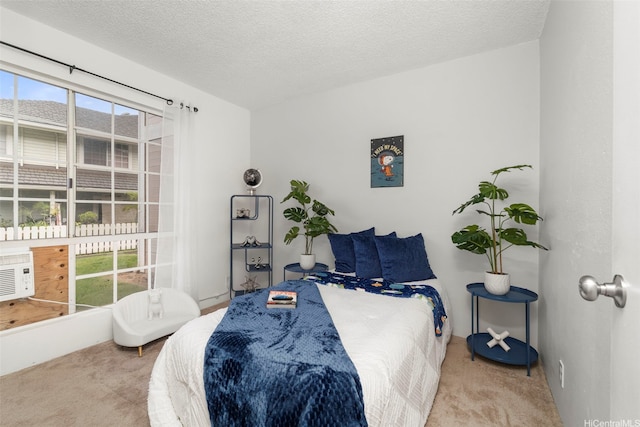 94-1465 Waipio Uka St Unit S103, Waipahu, HI 96797 - bedroom featuring carpet flooring, multiple windows, and a textured ceiling