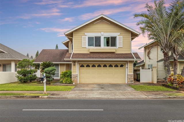 94-547 Lumiauau St, Waipahu, HI 96797 - traditional-style house featuring concrete driveway, an attached garage, stone siding, and a shingled roof