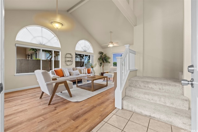 94-547 Lumiauau St, Waipahu, HI 96797 - living room featuring stairs, ceiling fan, high vaulted ceiling, beamed ceiling, and light wood finished floors