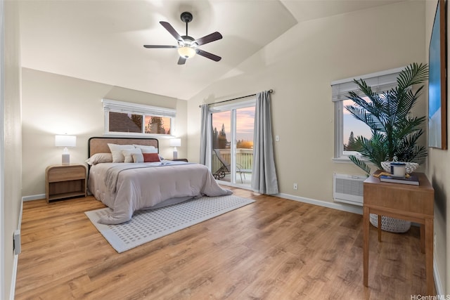 94-547 Lumiauau St, Waipahu, HI 96797 - bedroom featuring access to exterior, vaulted ceiling, light wood finished floors, an AC wall unit, and a ceiling fan